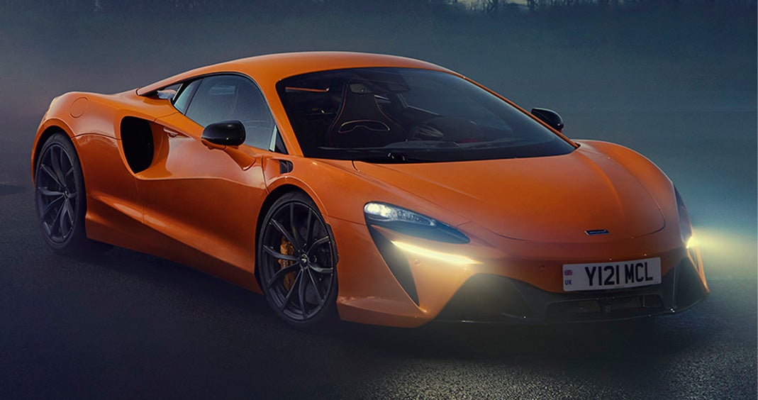 Artura Navara with headlights on