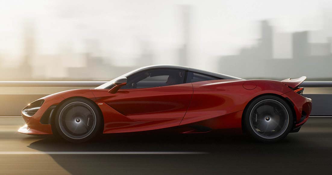 Side profile of the 750S driving fast