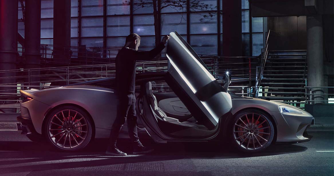 Man getting inside of of GT though the lightweight doors