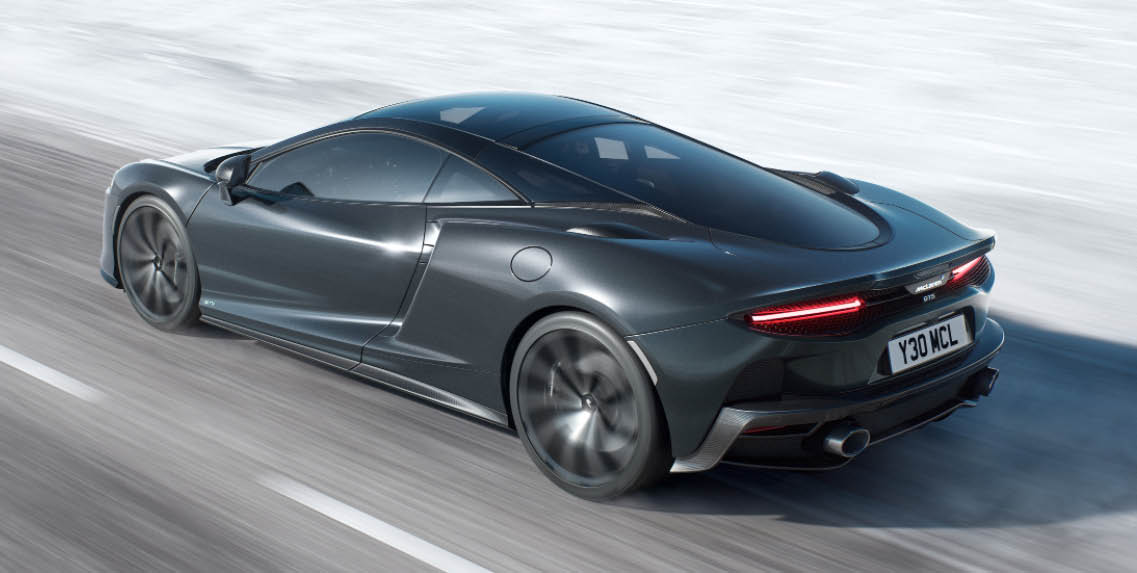 luxury sports car driving fast